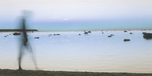 Shadow of man on a beach